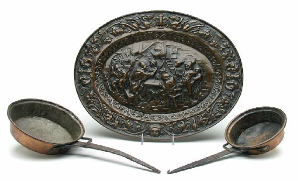 Appraisal: A group of two brass repousse wall plaques together with