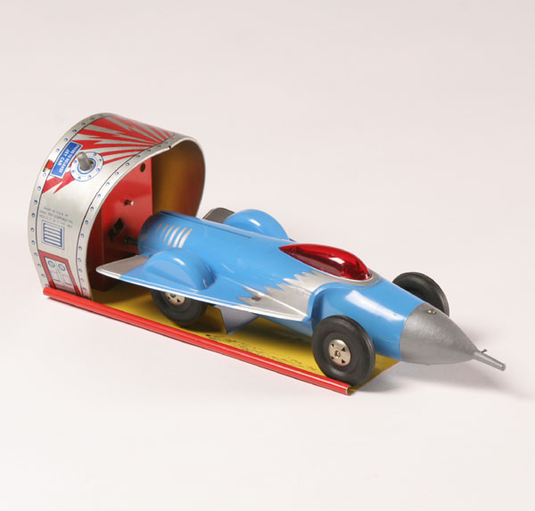 Appraisal: Ideal toy mechanical jet car with launcher tin launcher and