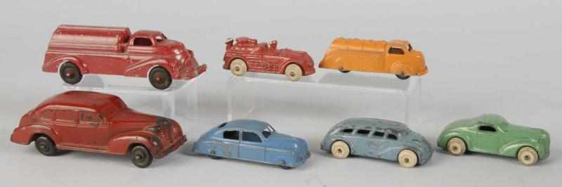 Appraisal: Lot of Cast Iron Vehicle Toys Description American Includes one