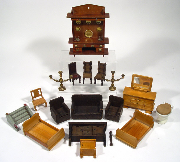 Appraisal: Selection of dolls house furniture including brass candlesticks Art Deco