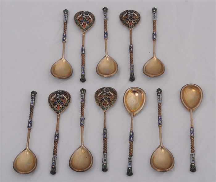 Appraisal: SET OF TWELVE RUSSIAN CHAMPLEVE ENAMEL AND SILVER COFFEE SPOONS