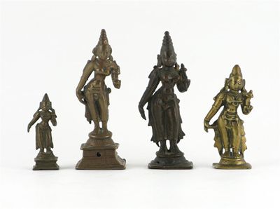 Appraisal: Four Indian copper and bronze standing figures of Sridevi th