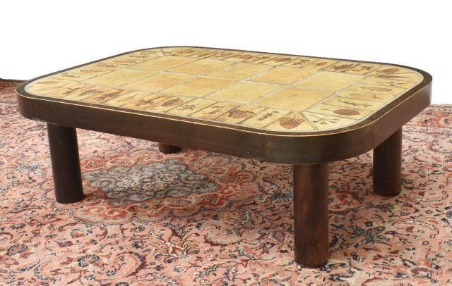 Appraisal: French modern coffee table c s rounded rectangular wood frame