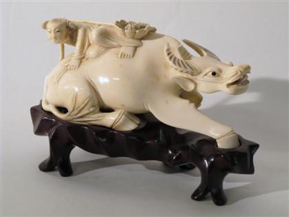 Appraisal: Chinese carved elephant ivory buffalo modelSingle section of buffalo and