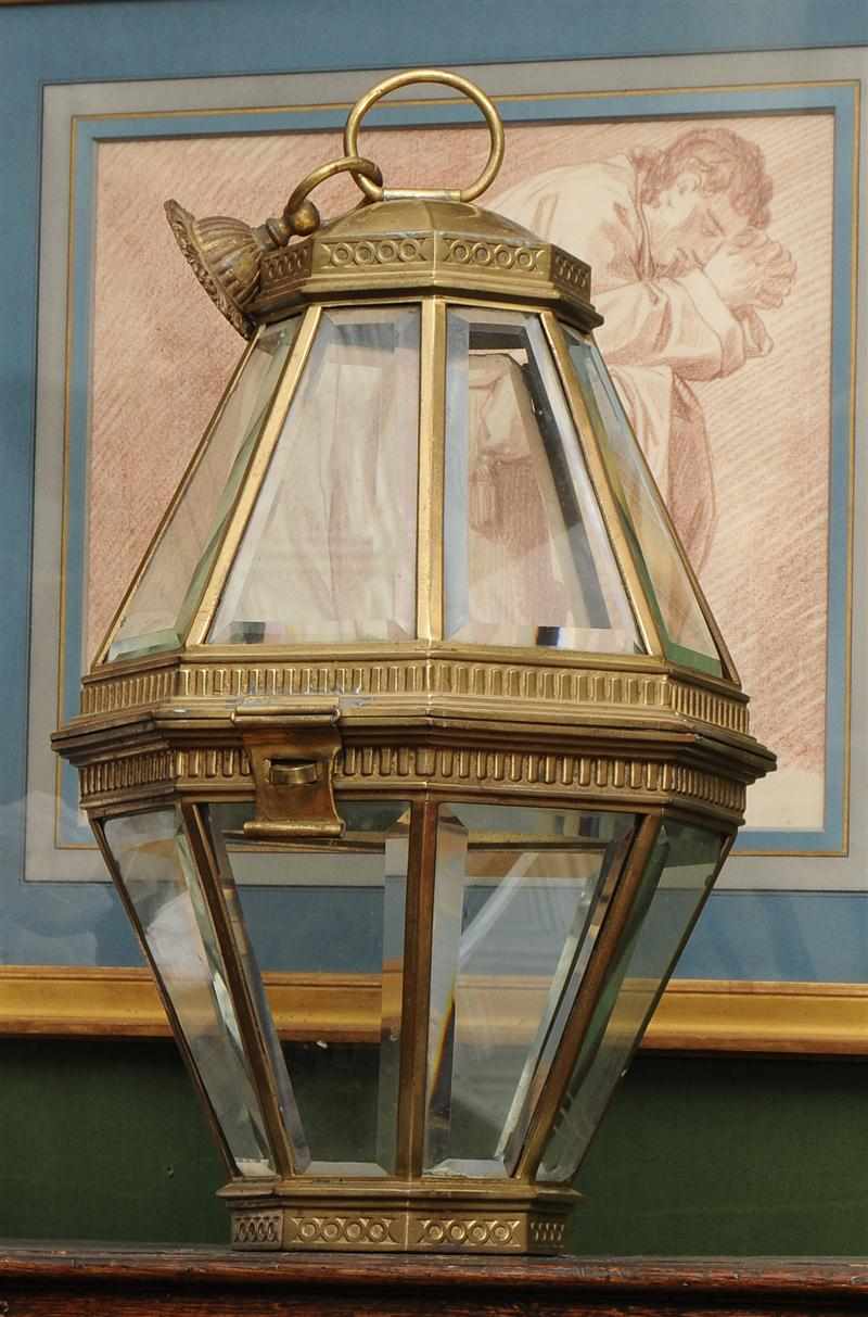 Appraisal: REGENCY BRASS OCTAGONAL LANTERN With hinged beveled glass panels tapering