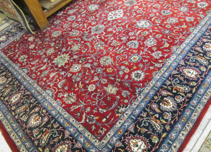 Appraisal: HAND KNOTTED ORIENTAL CARPET Pakistani Persian Isfahan floral design on