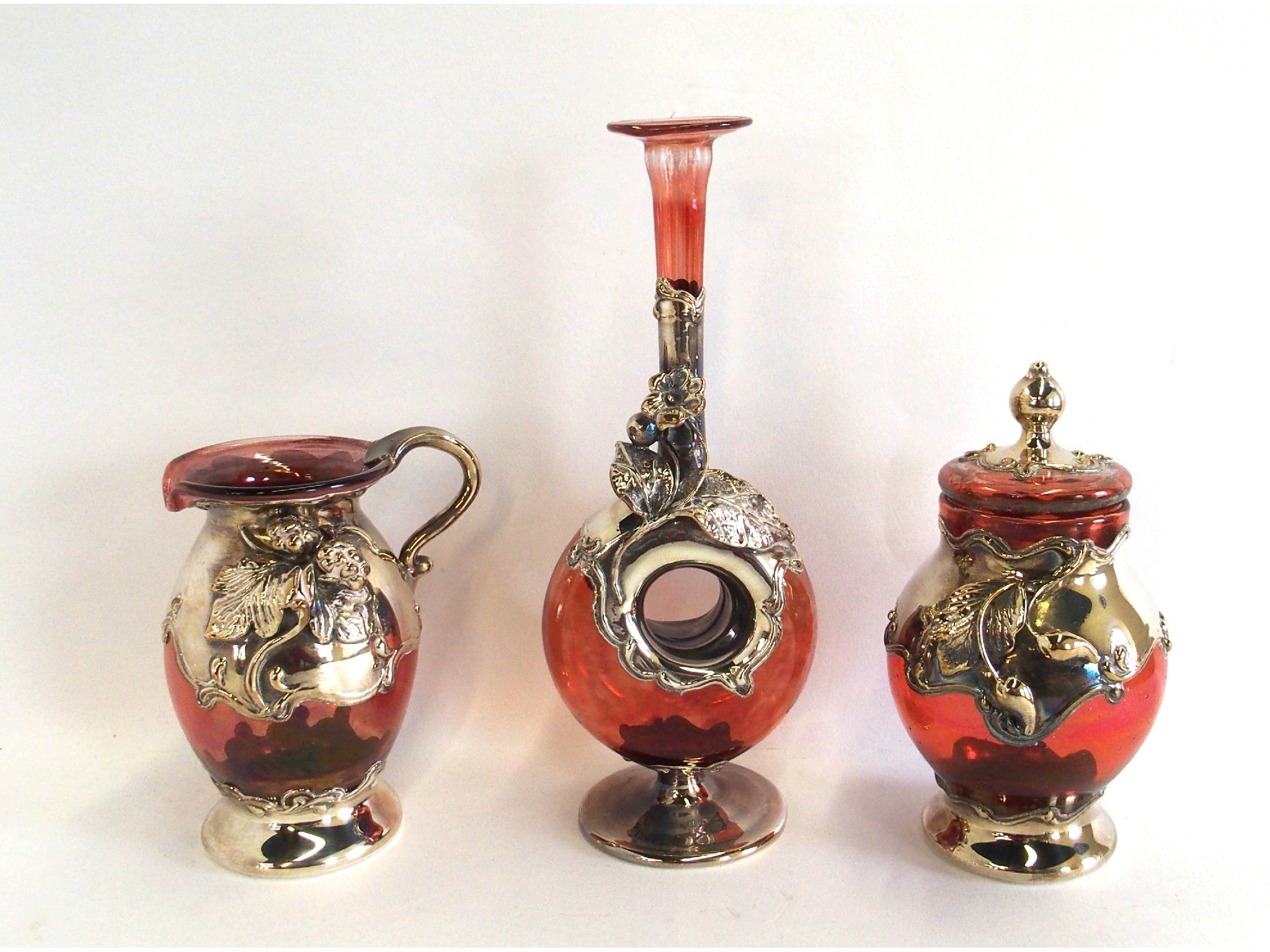 Appraisal: Three pieces of cranberry glass with silvered applied decoration