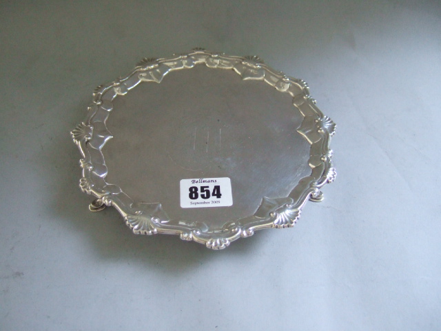 Appraisal: An early George III silver small shaped circular waiter decorated