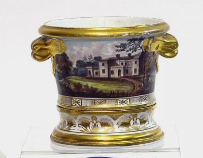 Appraisal: AN ENGLISH PORCELAIN CACHE POT and stand of mildly tapering