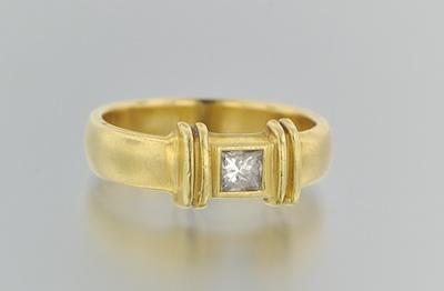 Appraisal: A Tiffany Co k Gold and Diamond Solitaire Ring k