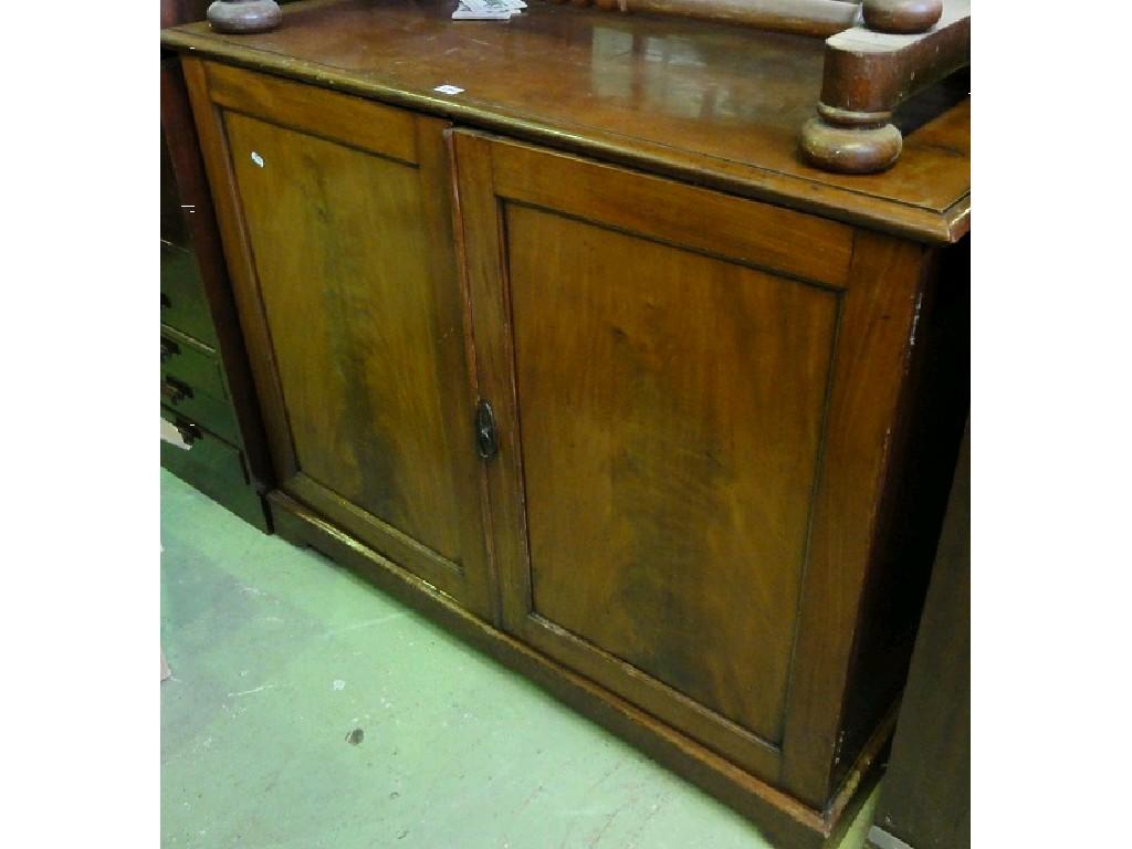 Appraisal: A th century mahogany linen cupboard enclosed by a pair