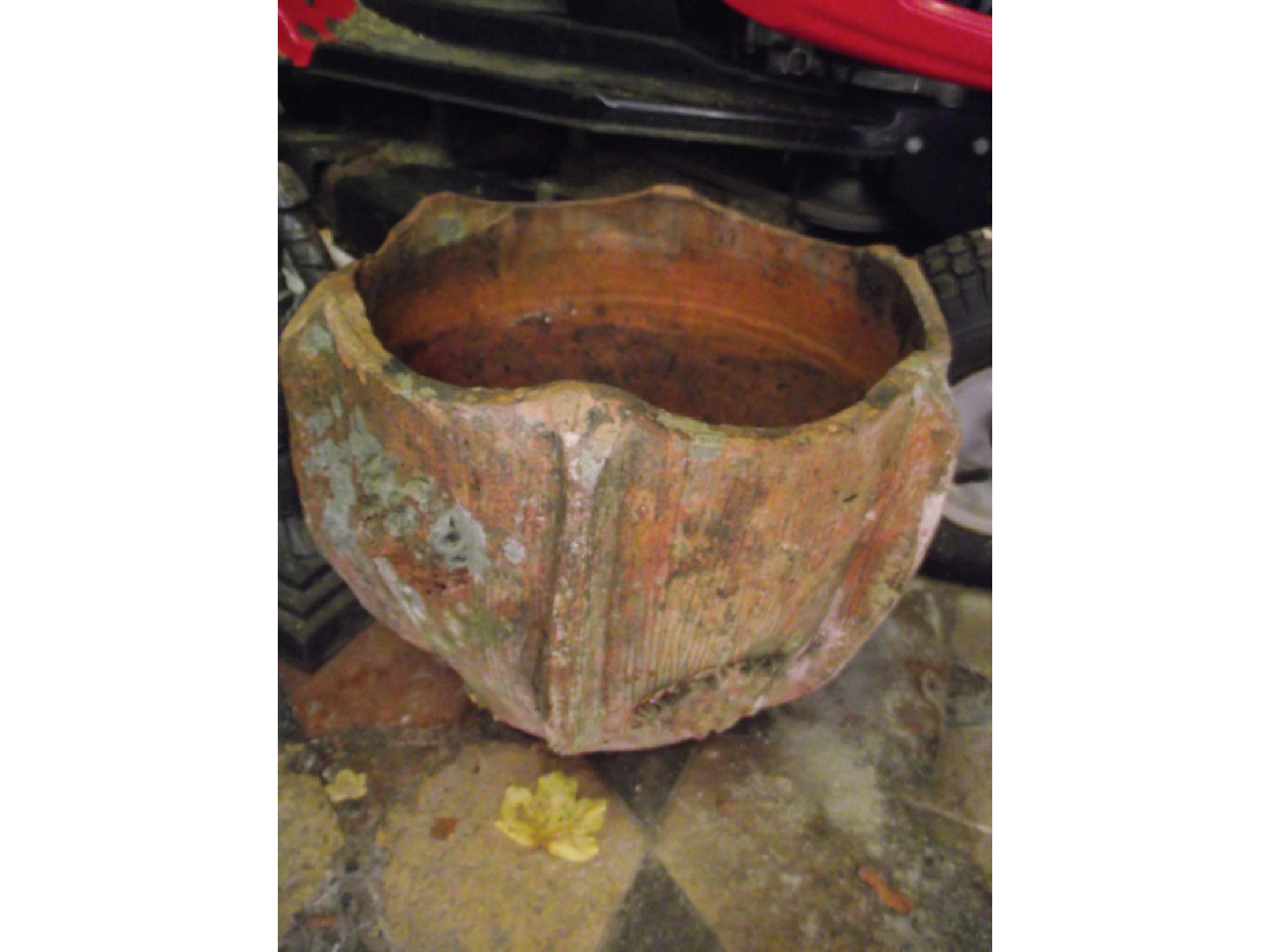 Appraisal: A Victorian terracotta garden urn of circular tapered form with