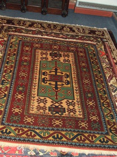 Appraisal: A TURKISH RUG - woven with hooked pole medallion on