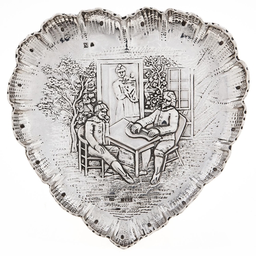 Appraisal: A Continental heart shaped silver dish embossed with a seated