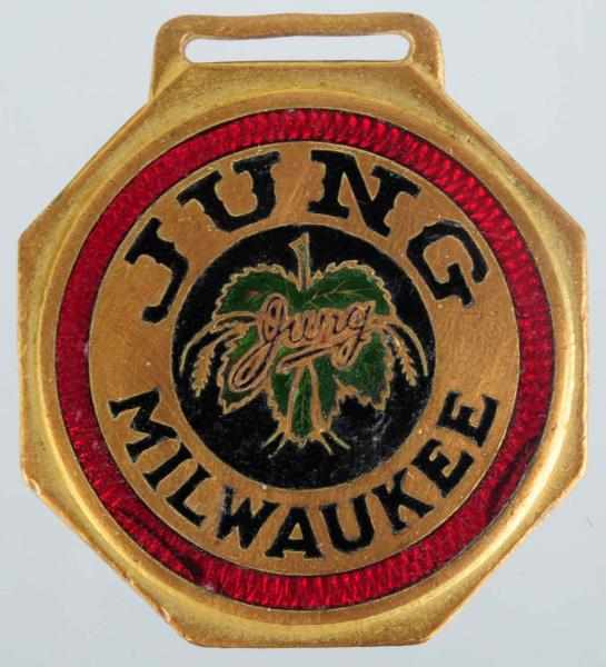 Appraisal: Jung Brewing Company Enameled Fob Some wear and scratching to