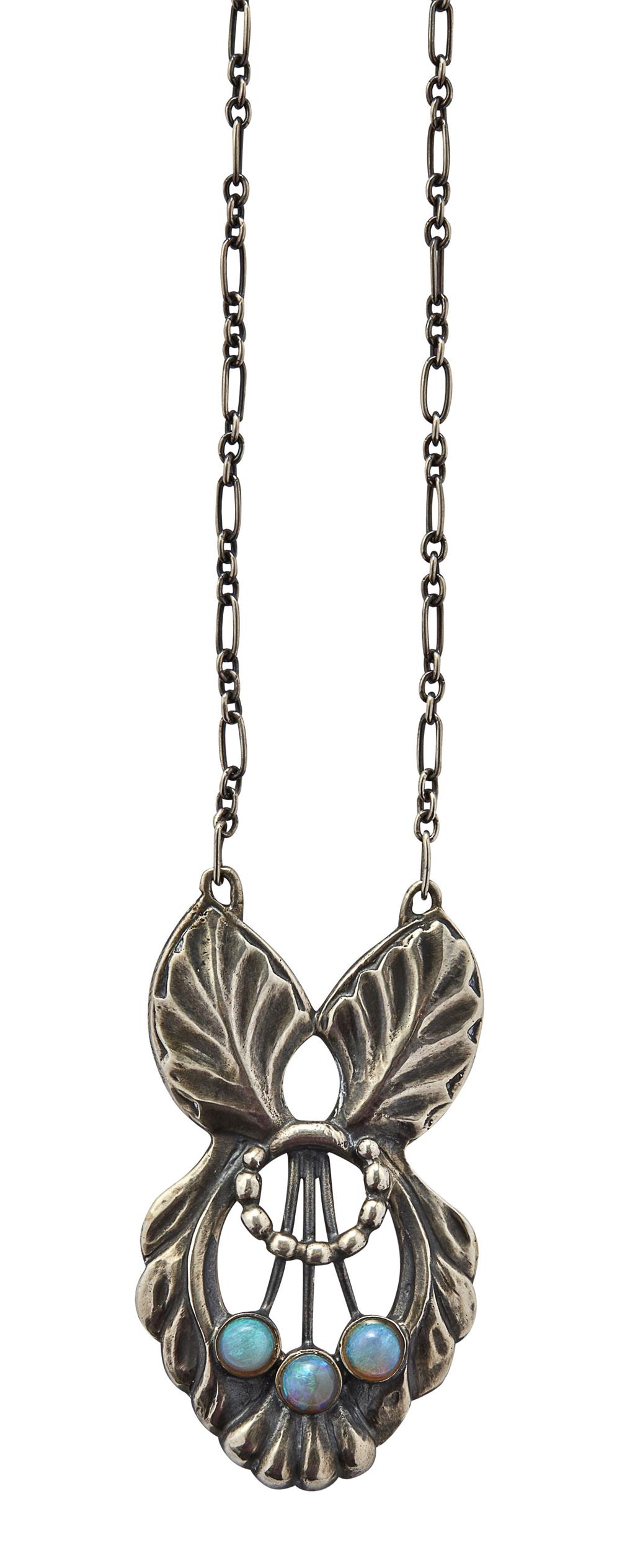 Appraisal: GEORG JENSEN - STERLING PENDANT CIRCA of openwork double leaf