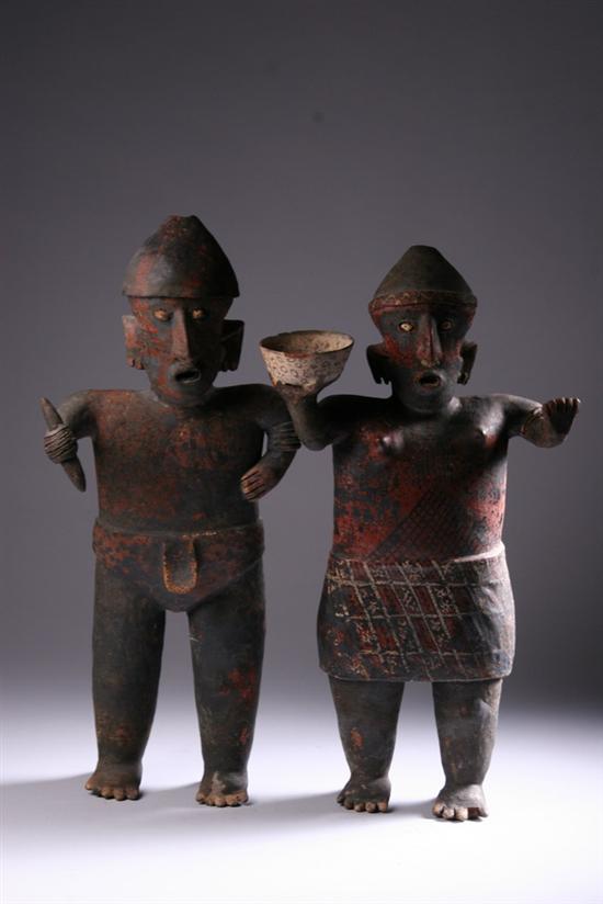 Appraisal: NAYARIT POTTERY FIGURES OF WARRIOR AND FEMALE Protoclassic circa B