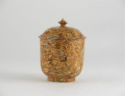 Appraisal: A solid agateware sugar bowl and cover with a cylindrical