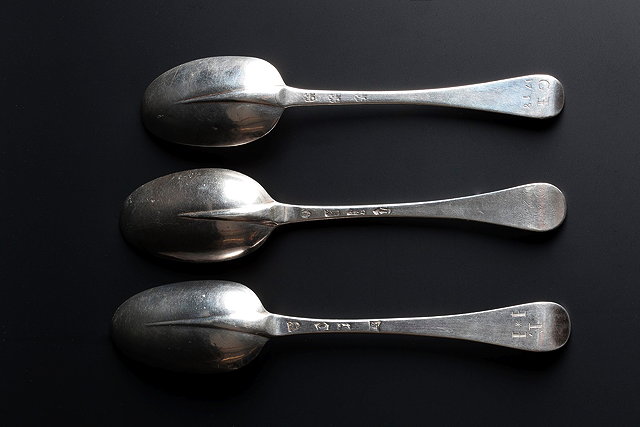 Appraisal: THREE HANOVARIAN RAT TAIL TABLESPOONS one by Henry Miller I