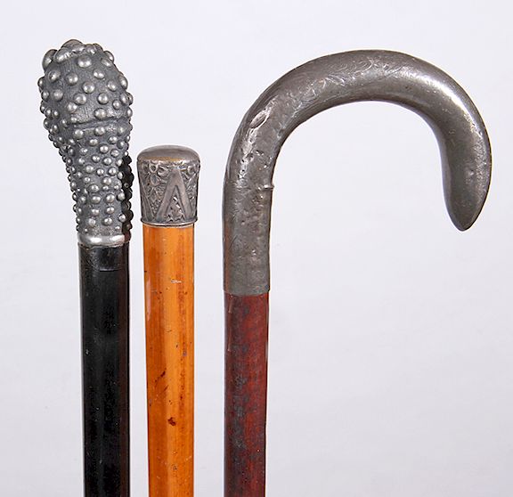 Appraisal: Three Silver Canes Ca - three silver handles with the