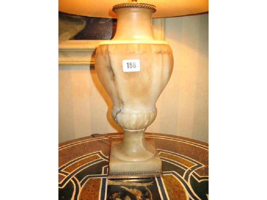 Appraisal: AN ALABASTER TABLE LAMP of neo-classical design in the form