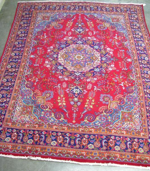 Appraisal: A vintage Handmade Oriental Room Size Rug Tabriz design red