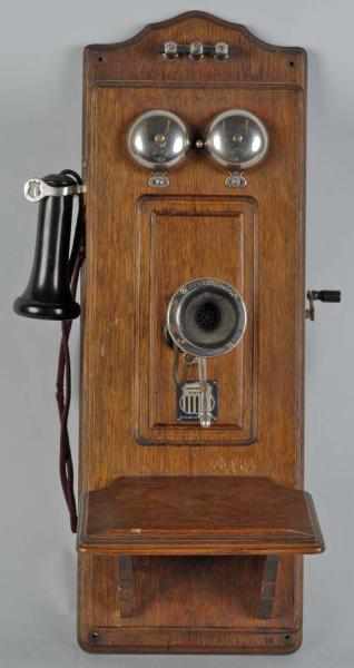 Appraisal: American Electric CTPFF Telephone Description Circa Oak swing-away transmitter beautiful