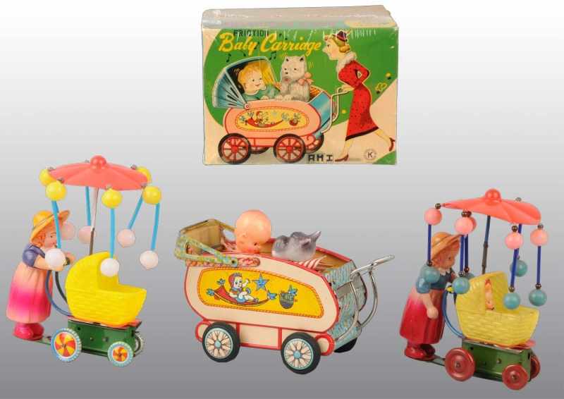 Appraisal: Lot of Tin Celluloid Baby Buggy Toys Description Japanese Working