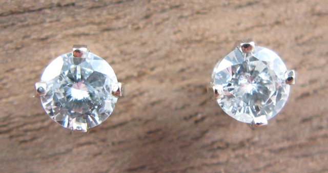 Appraisal: PAIR OF DIAMOND AND WHITE GOLD EAR STUDS each k