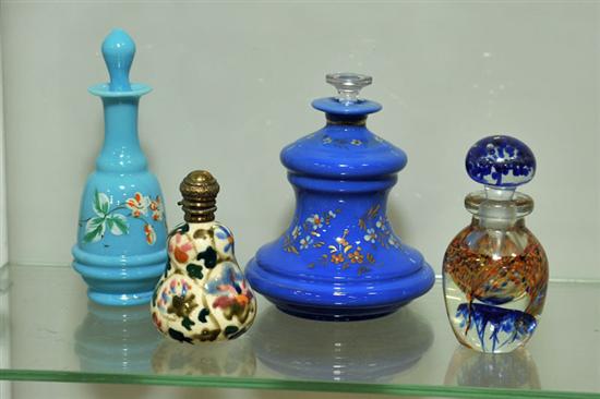 Appraisal: FOUR GLASS PERFUME BOTTLES One in robin's egg blue glass