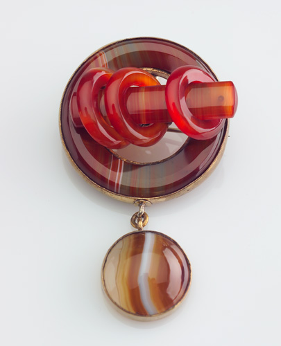 Appraisal: SCOTTISH Agate gold-filled brooch circa The banded agate ring is