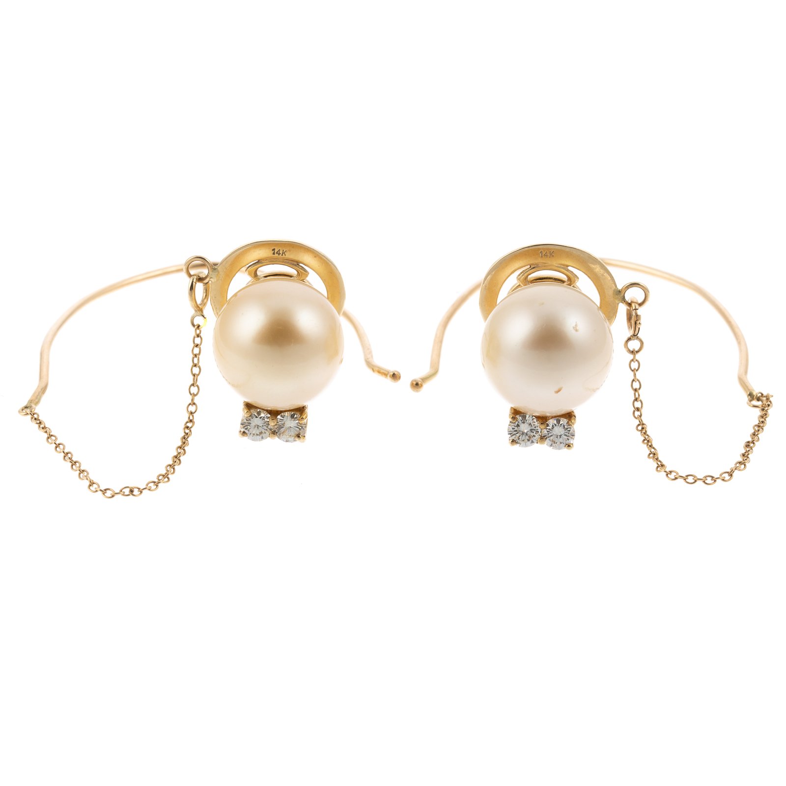 Appraisal: A PAIR OF GOLDEN SOUTH SEA PEARL DIAMOND EARRINGS K