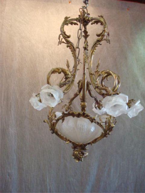 Appraisal: French bronze Rococo style chandelier Has Lalique style shades missing