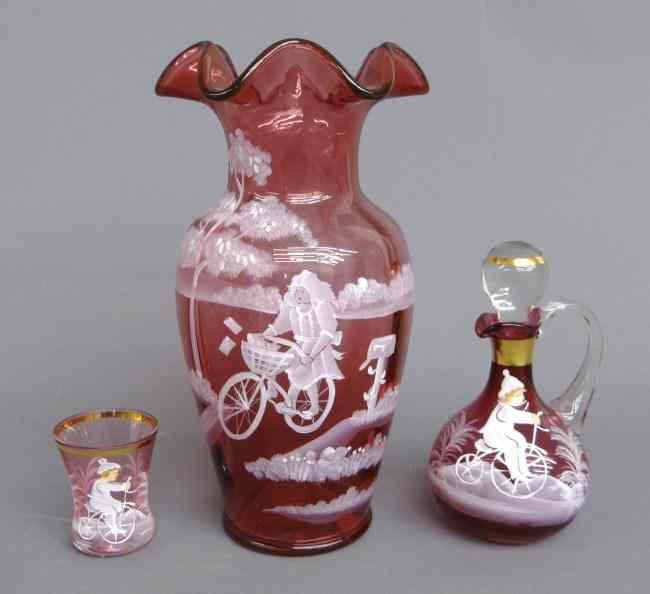 Appraisal: Lot including '' Ht Fenton glass vase with painted cyclist