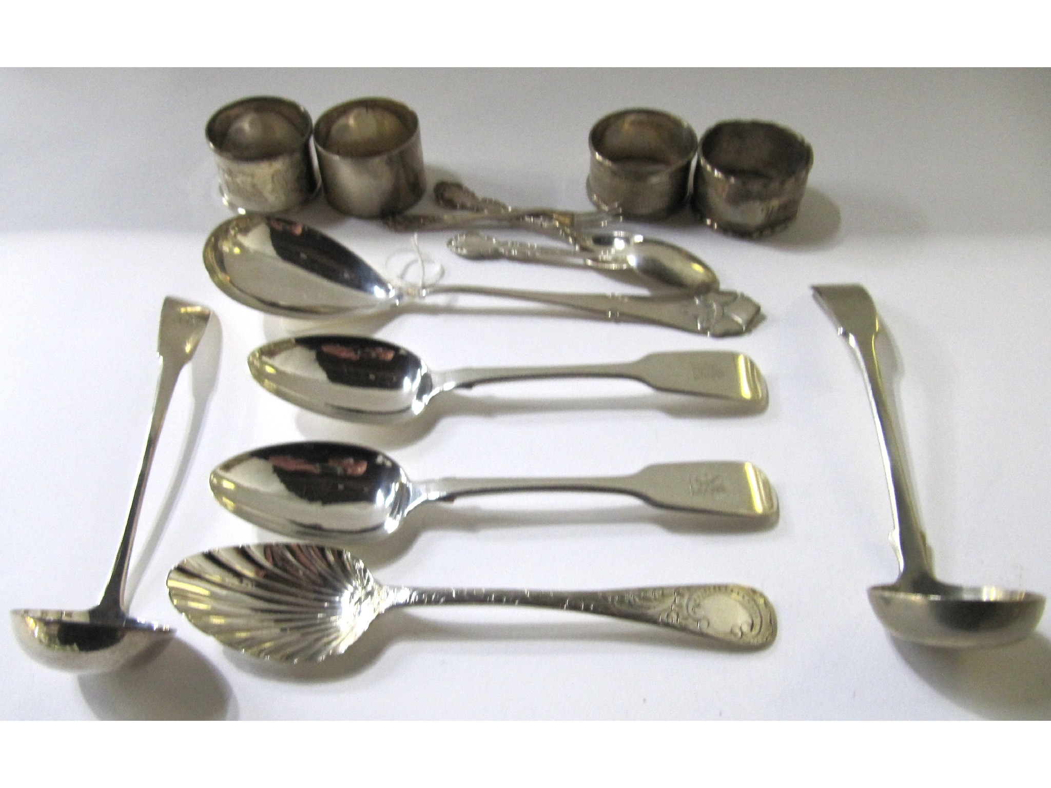 Appraisal: A lot comprising a Danish silver serving spoon three silver