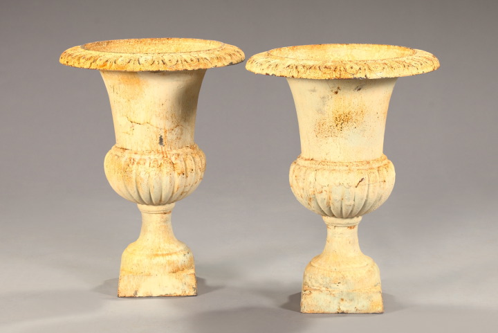 Appraisal: Pair of Cast-Iron Campana-Form Garden Urns each having a flared