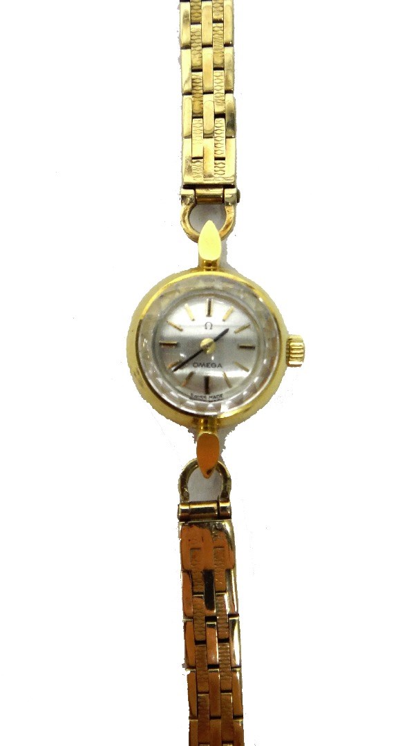 Appraisal: A lady's gold circular cased Omega wristwatch the signed circular