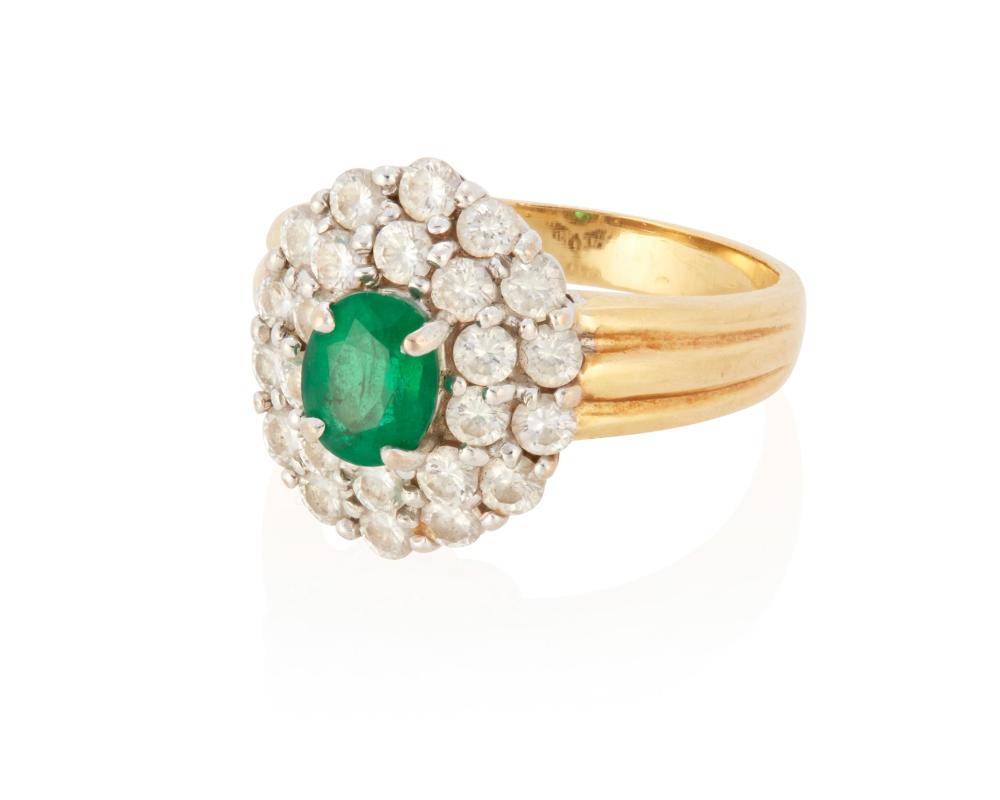 Appraisal: AN EMERALD AND DIAMOND RINGAn emerald and diamond ring k