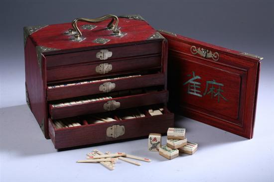 Appraisal: CHINESE MAHJONG BONE AND BAMBOO SET AND BRASS-MOUNTED BOX Circa