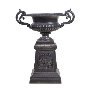 Appraisal: A Painted Cast Iron Garden Urn and Pedestal Height x