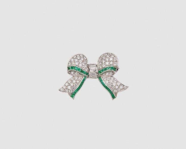 Appraisal: Platinum Diamond and Emerald Bow Brooch Platinum Diamond and Emerald