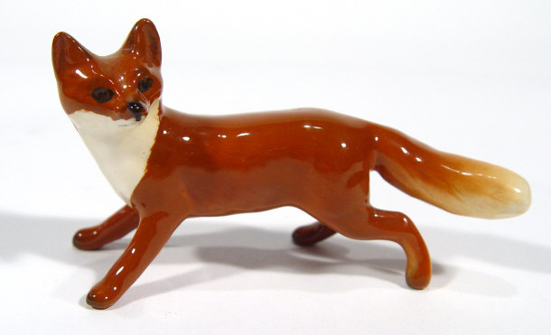 Appraisal: Small Beswick fox with hand painted decoration factory mark to