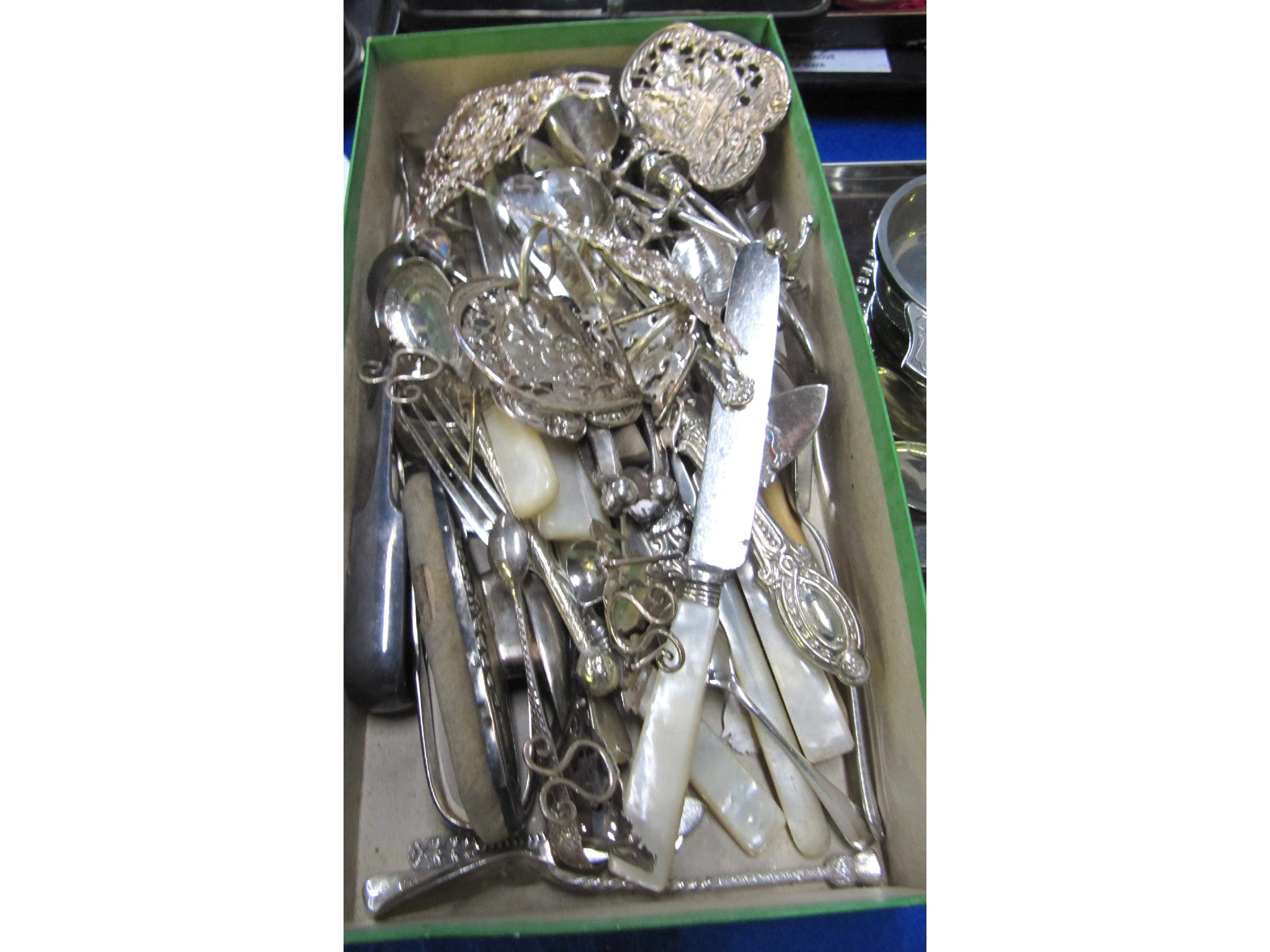 Appraisal: A box of loose cutlery and menu holders