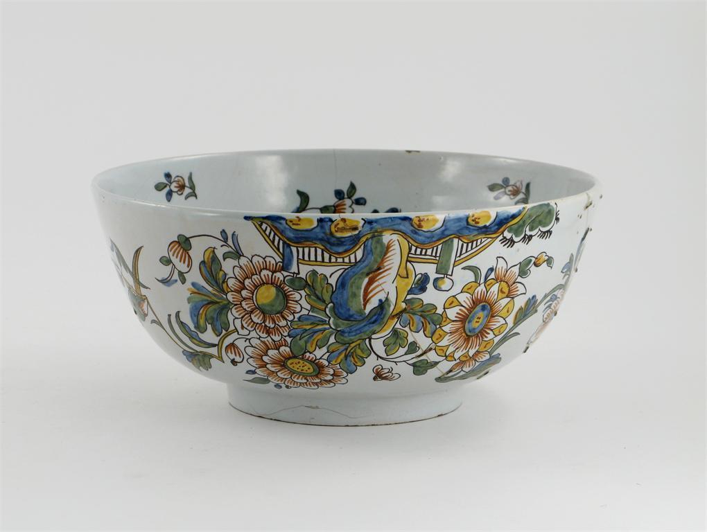 Appraisal: A large delftware punch bowl inscribed