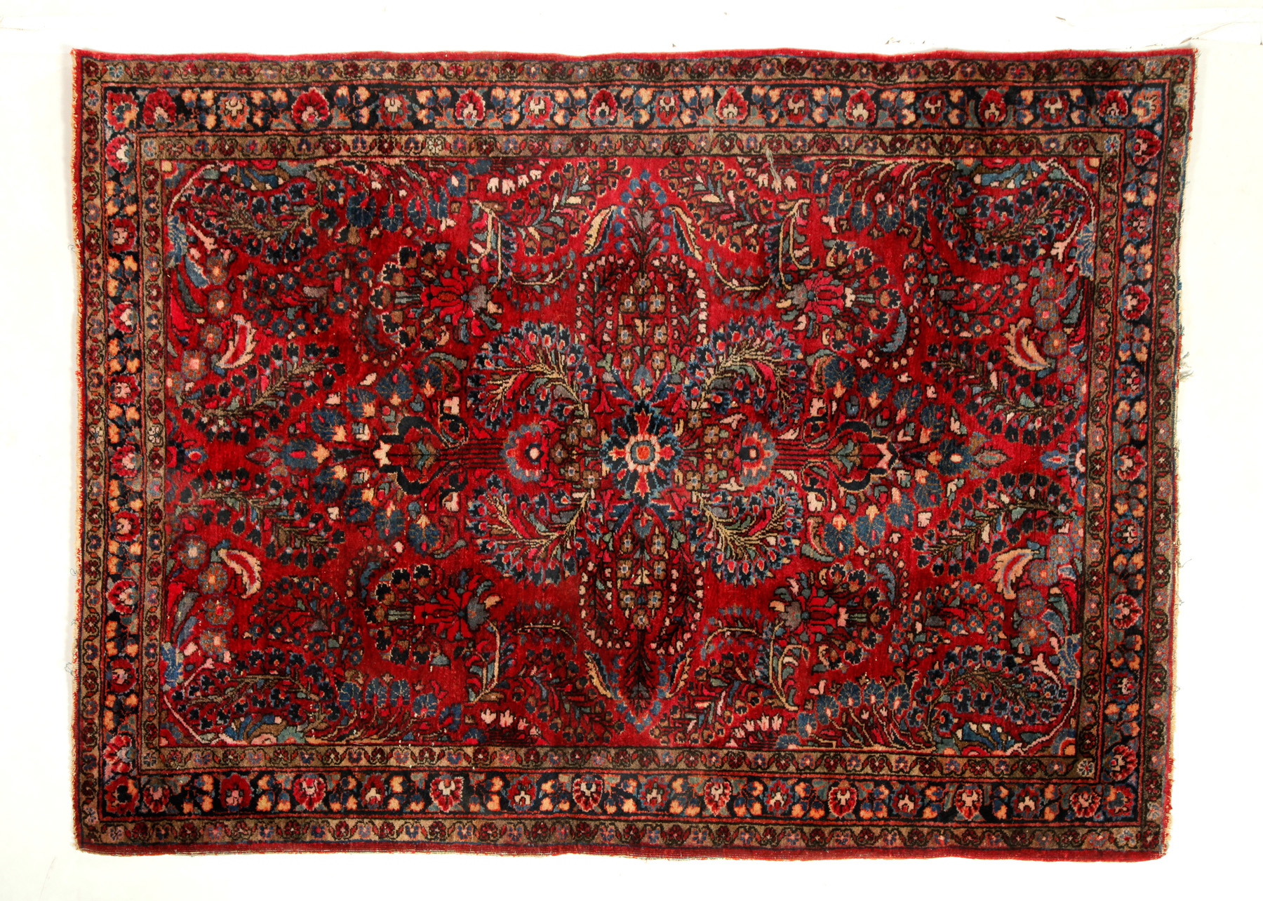 Appraisal: ORIENTAL RUG Ca Sarouk with a burgundy ground ' x