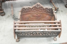 Appraisal: A cast iron fireplace together with a cast iron fire