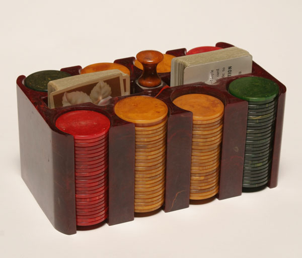 Appraisal: Marbled Bakelite cased poker chips H x W