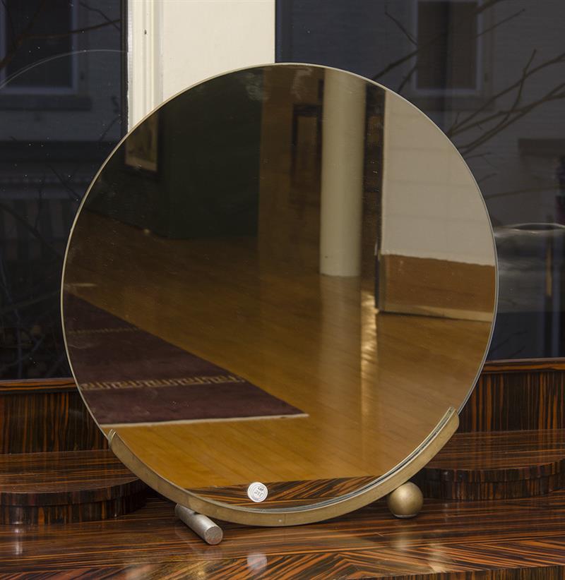 Appraisal: MODERN BRASS MIRROR The circular mirror plate with a brass