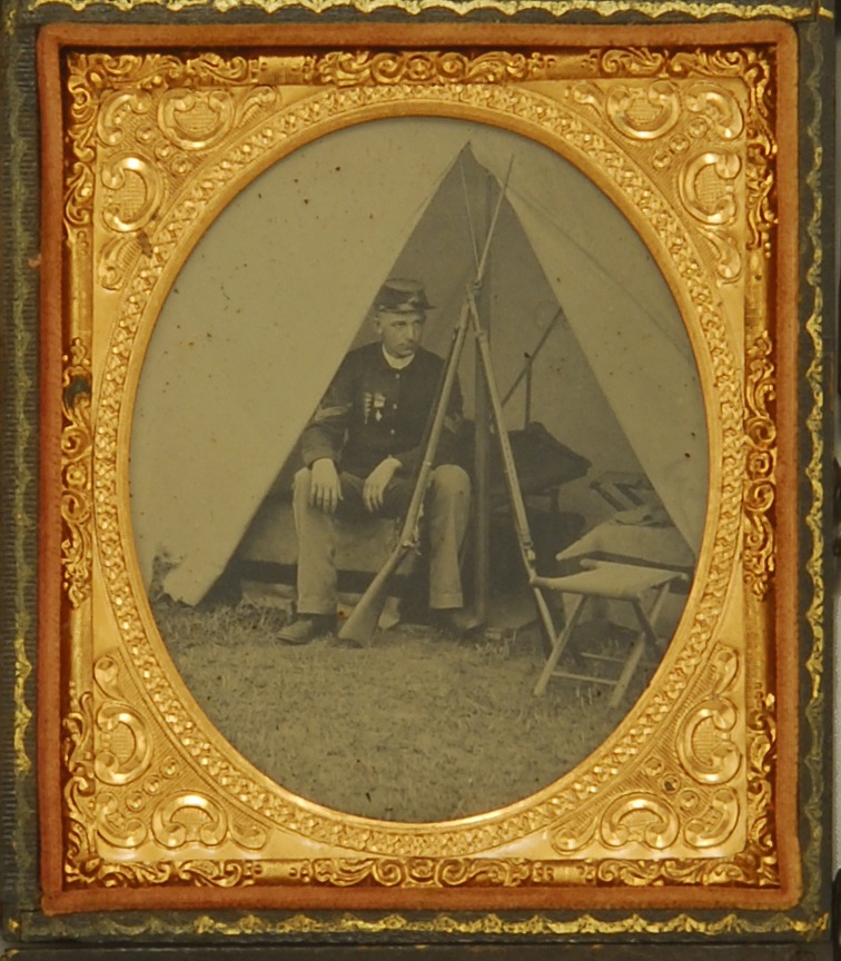 Appraisal: CASED TINTYPE OF A POST-CIVIL WAR ENCAMPED UNION SOLDIER Post