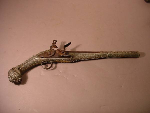 Appraisal: A silver-mounted Ottoman flintlock kubur pistol The inch caliber barrel